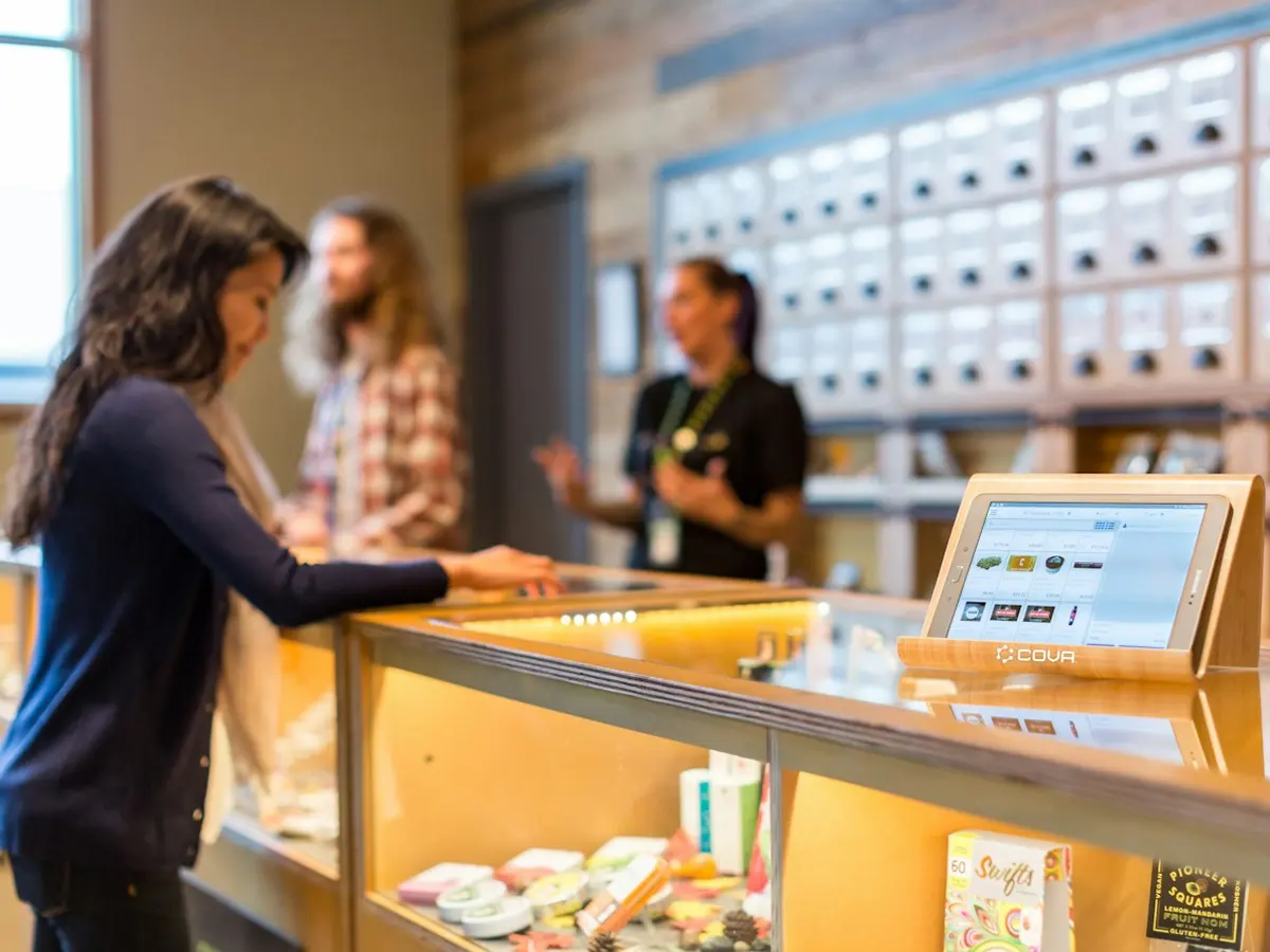 Customers served at a dispensary counter