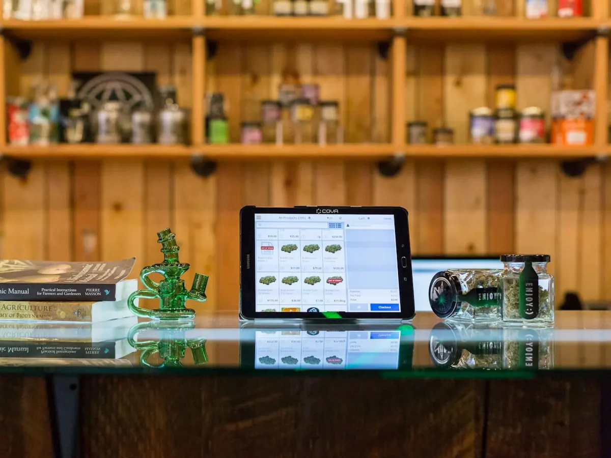 Point-of-sale tablet on a dispensary counter