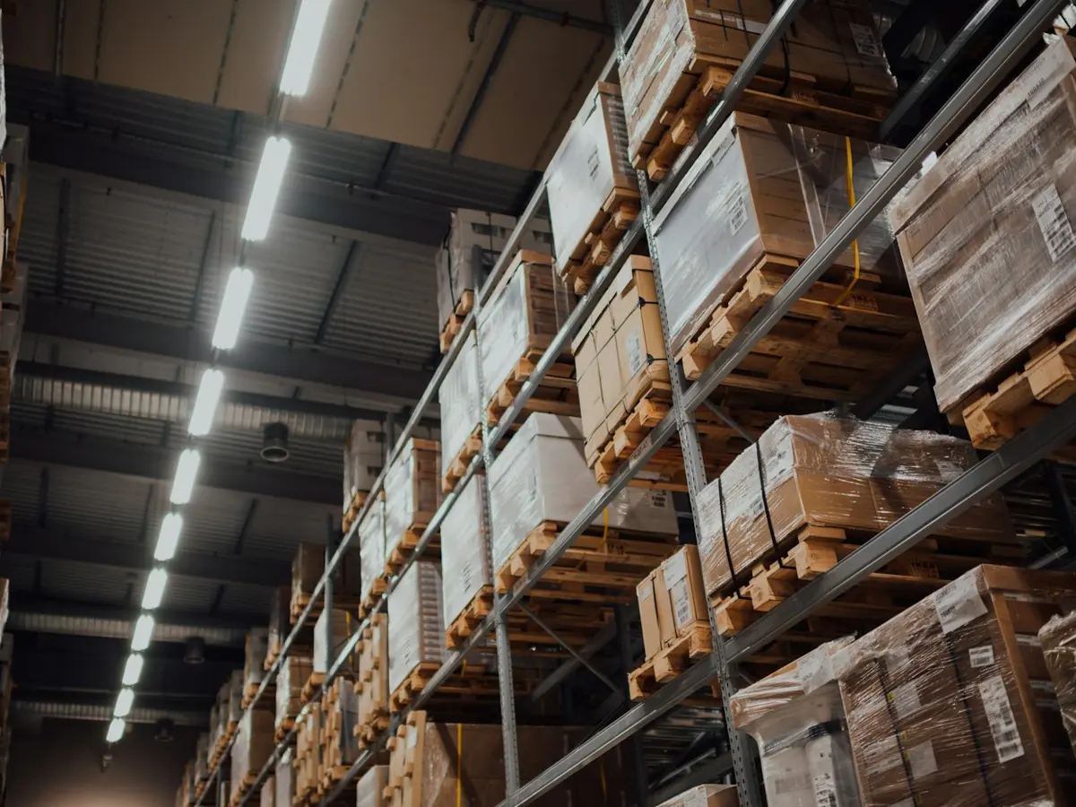 Warehouse racking stacked with cartons of inventory
