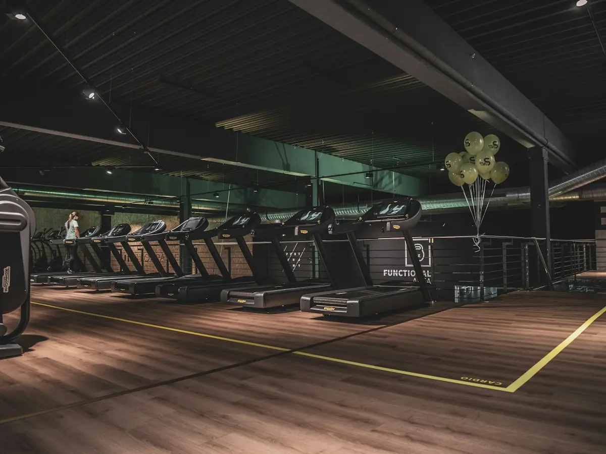Row of treadmills in an empty gym