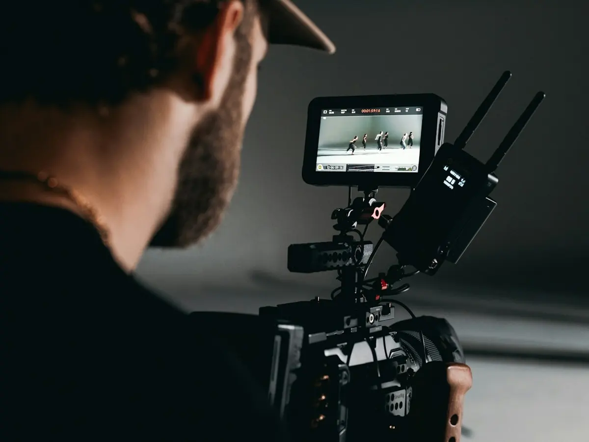 Creator recording a lesson on a video camera