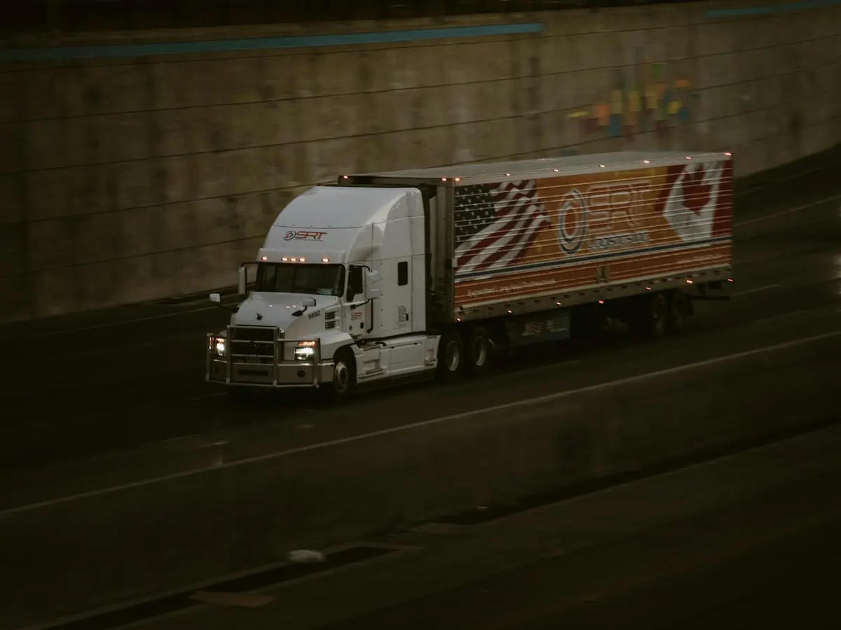 Tractor-trailer parked at night